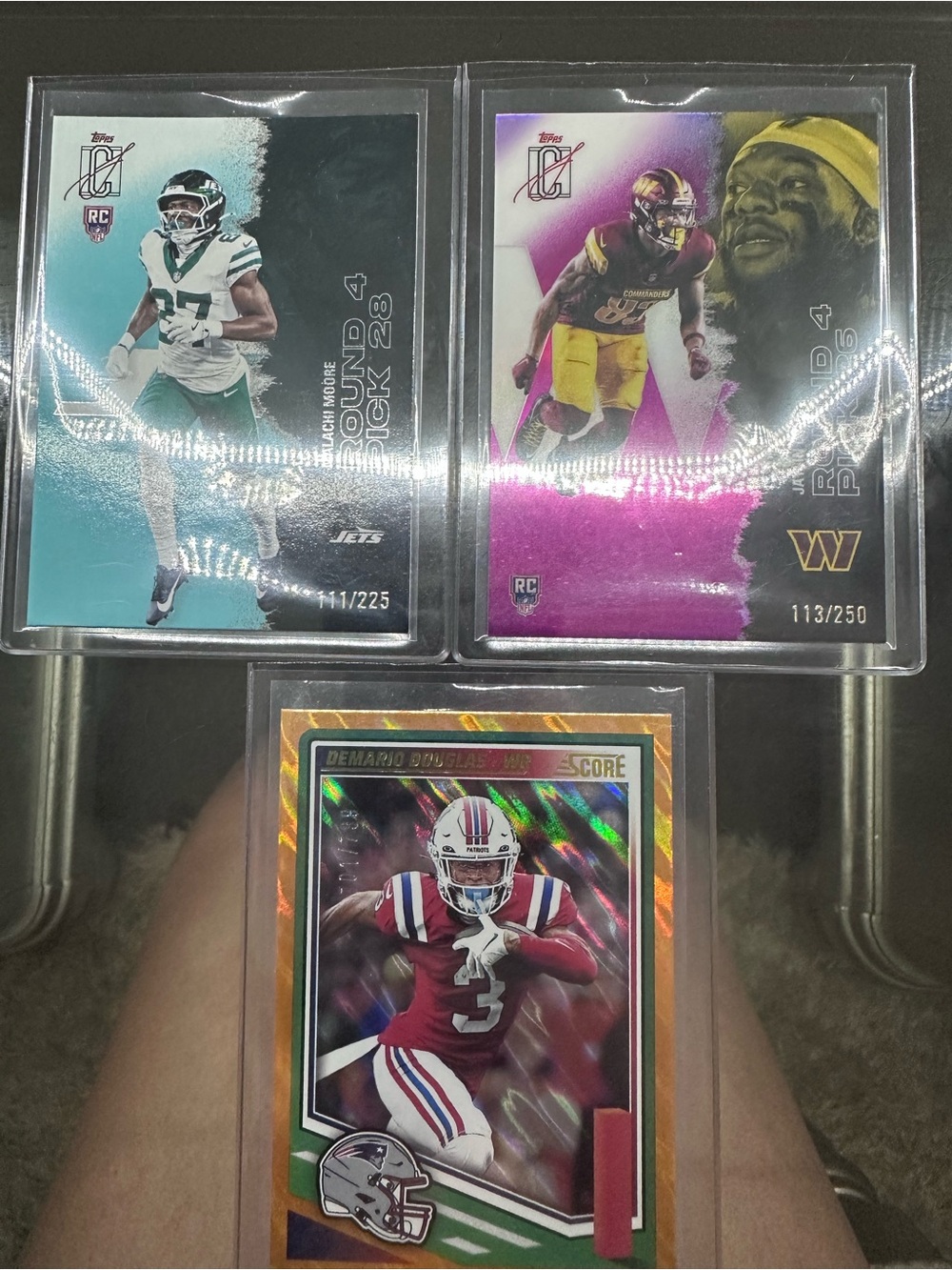 Demario Douglas 701/799, Malachi Moore RC 111/225, Jaylin Lane RC 113/250
